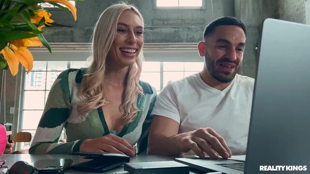 Sweet blonde Kay Lovely opens her wet shaved pussy on cam