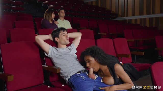 Stylish ebony model Tina Fire fucked in the cinema by white man